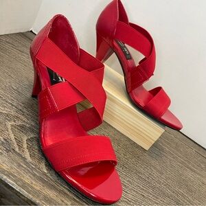 AJ Valenci patent leather Strappy Heels. Size 7.5 W. Pre-owned. Some scratches.